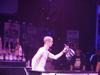 Ian Duncan - Naked and Whipped Creamed - Another crazy Canadian doing some freaky stuff.  He is in a bath towel and has whipped cream on his bald head holding a cup...